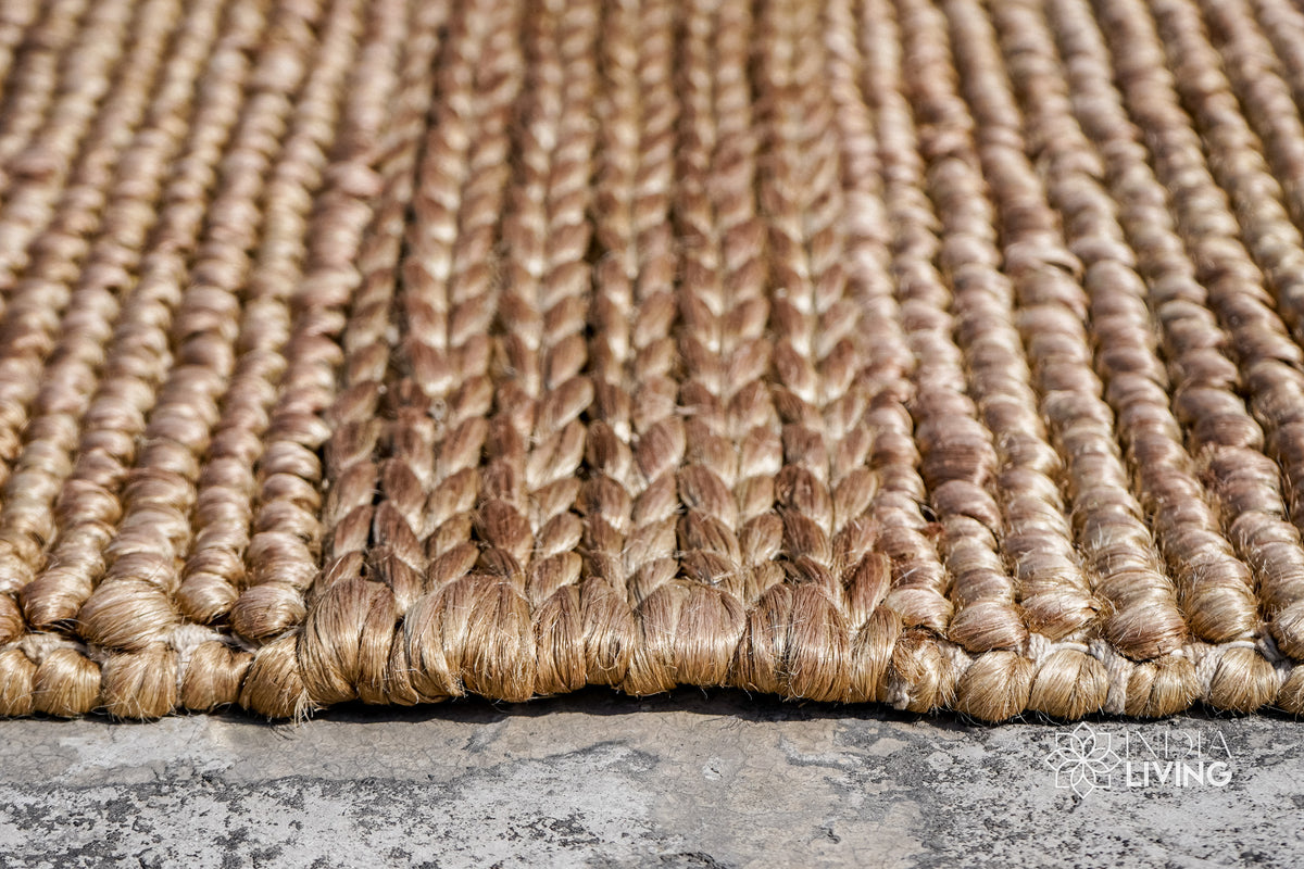 Natural beige jute rug in a dining room setting