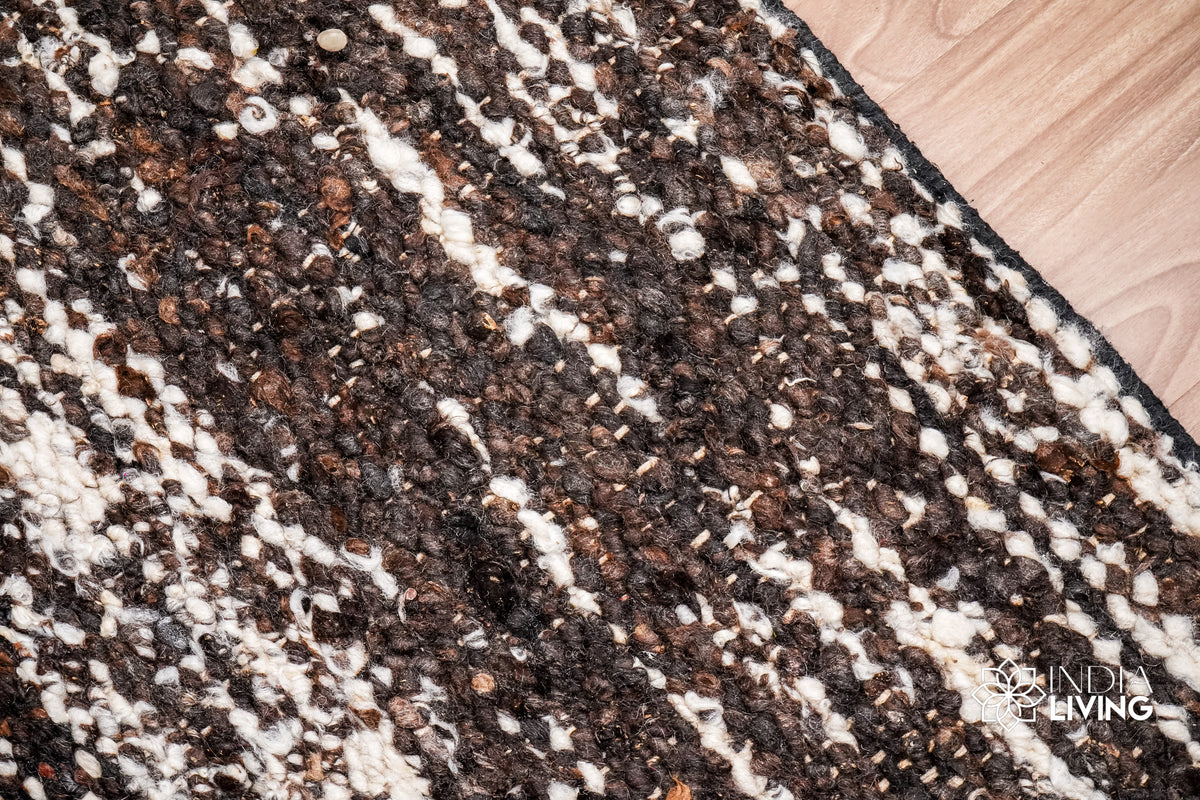 Wool rug corner detail showing flatweave texture
